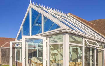 conservatory roof insulation costs Budds Titson